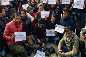 Journalists stage peaceful protest against denial of entry at Republic Day event.