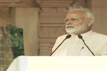 Addressing a rally of his party workers in Thrissur, Kerala, PM Modi said; "As long as I am there in Delhi, I will not allow any kind of corruption and will not allow the nation's unity and integrity to be destroyed".