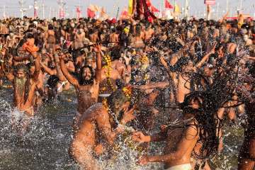 Naga Sadhus take holy dip in Ganga.