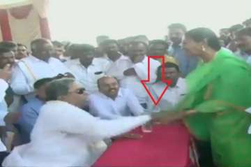 News agency ANI has published a video which shows former Karnataka CM 'misbehaving' with the woman.?