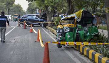 The mangled remains of the auto rickshaw which was hit by a Bentley sedan car reportedly driven by industrialist Ponty Chadha's nephew seen at the accident site, in New Delhi, Monday