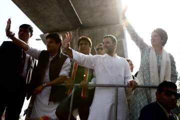 Priyanka Gandi, alongwith Rahul Gandhi and Jyotiraditya Scindia during the roadshow in Lucknow today