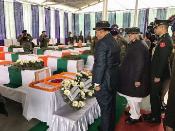 Union Home Minister Rajnath Singh along with J & K Governor Satya Pal Malik pays tribute to the CRPF personnel, who lost their lives in Pulwama terror attack