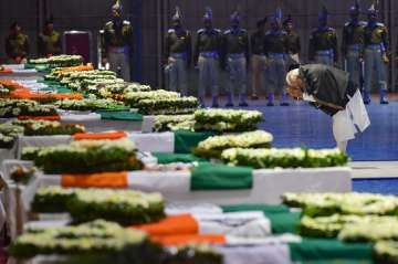 PM Modi pays tribute to slain CRPF men at Palam airport, Delhi