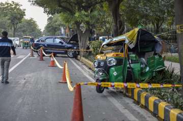 The mangled remains of the auto rickshaw which was hit by a Bentley sedan car reportedly driven by industrialist Ponty Chadha's nephew seen at the accident site, in New Delhi