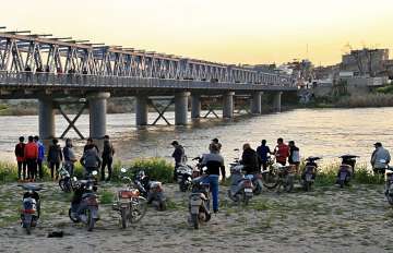 Ferry overloaded with people celebrating holiday sinks in Mosul 