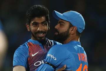 Virat Kohli gives Jasprit Bumrah a standing ovation on hitting a six in the last ball