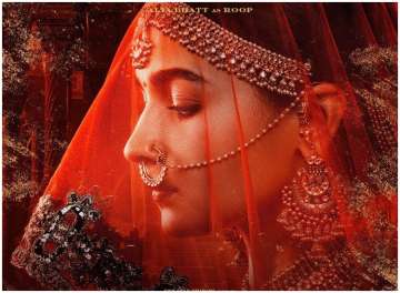 Kalank new character poster: Karan Johar unveils Alia Bhatt's look as Roop, says to love her is to love fire