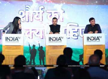 Pawan Khera and Sambit Patra in a debate at India TV conclave
