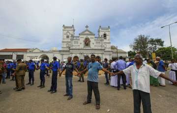 Sri Lankan army soldiers secure the area around St. Anthony's Shrine after a blast in Colombo