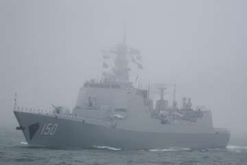 Qingdao: The type 052C destroyer Changchun of the Chinese People's Liberation Army (PLA) Navy participates in a naval parade to commemorate the 70th anniversary of the founding of China's PLA Navy in the sea near Qingdao in eastern China's Shandong province.