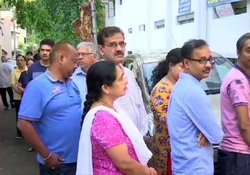 People queue up outside polling stations in Girinagar area of Bangalore South
?