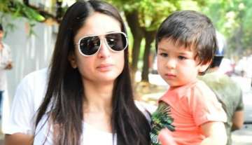 Taimur Ali Khan joins mom Kareena Kapoor while she steps out to vote in elections 2019