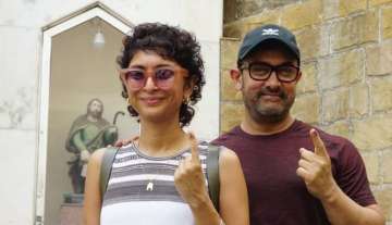 Aamir Khan walks hand-in-hand with wife Kiran Rao to cast vote in elections 2019; cracks a joke