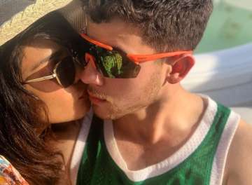 Priyanka Chopra trips and clasps husband Nick Jonas' arm, netizens find it adorable