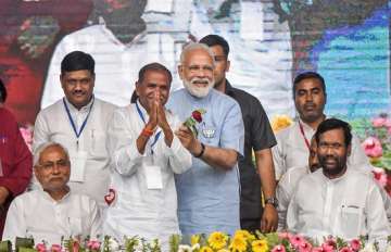 Prime Minister Narendra Modi with Bihar Chief Minister Nitish Kumar, Lok Janshakti Party (LJP) chief Ram Vilas Paswan and others, during an election rally, ahead of the Lok Sabha polls
 