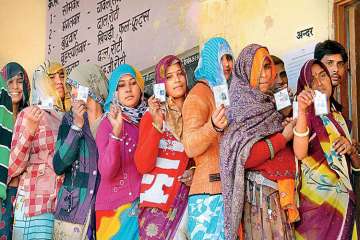 Voters wait for their turn