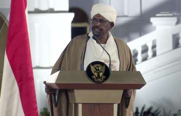 In this file image taken from video, Sudan's President Omar al-Bashir speaks at the Presidential Pal