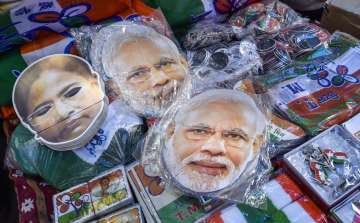 Kolkata: A display of masks of Prime Minister Narendra Modi and West Bengal Chief Minister Mamata Ba
