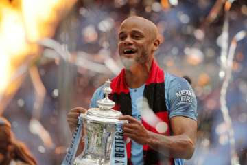 Kompany lifted the FA Cup title with Manchester City last night.
