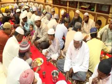 People enjoying iftar at Zaheer Uddin Khan Memorial Trust in Hyderabad