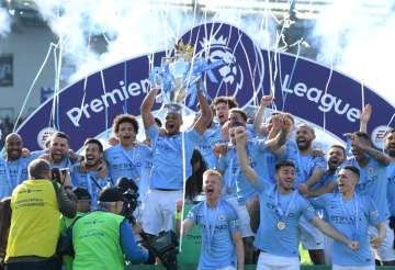 Manchester City pip Liverpool to retain Premier League title on final day of season