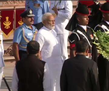 Prime Minister Narendra Modi pays tribute at the National War Memorial in Delhi.