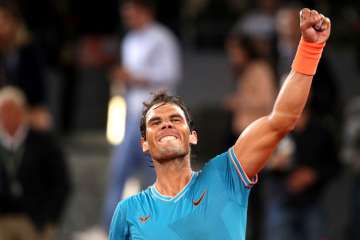 Rafael Nadal overcomes stomach virus to advance in Madrid Open