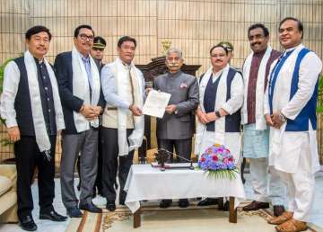 BJP Legislature Party leader Pema Khandu, accompanied by senior leader JP Nadda and others, submits letter of suport of MLas to Arunachal Pradesh Governor Brigadier (retd.) BD Mishra to stake claim for the formation of government, in Itanagar.