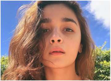 This sun-kissed picture of Alia Bhatt all the way from Switzerland is endearing