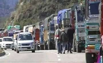 Jammu and Kashmir governor's administration withdrew an order restricting movement of civilian traffic on the national highway between Srinagar and Jammu