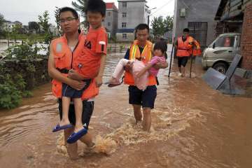 China floods: 16 people killed, scores of houses damaged as torrential rains wreak havoc