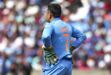 MS Dhoni removes Indian Army insignia from gloves