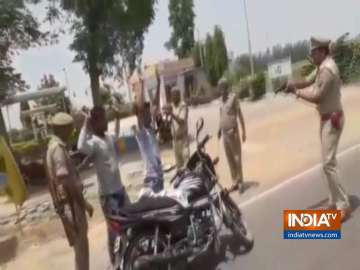 Hands up! Uttar Pradesh cops check vehicles at gun point | VIDEO