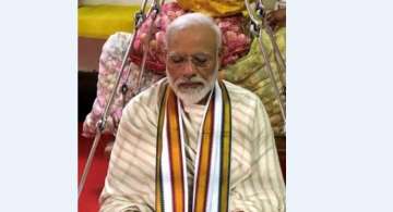 Prime Minister Narendra Modi prays at Sri Krishna Temple