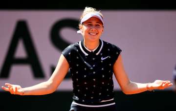 French Open 2019: Anisimova stuns Halep to advance to semis, faces Barty 