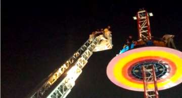 14 children among 40 rescued from tall merry-go-round 
