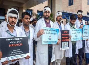 Members of Resident Doctors Association express their solidarity in protest against an attack on an interim doctor, at All India Institute of Medical Sciences