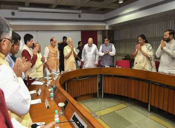 Prime Minister Narendra Modi, Defence Minister Rajnath Singh, Union Home Minister and BJP President Amit Shah, Road Transport and Highways Minister Nitin Gadkari and other BJP leaders during party's parliamentary party executive committee meeting
?
?