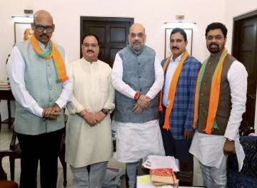 TDP Rajya Sabha MPs Y Sujana Chowdary, TG Venkatesh and CM Ramesh meet BJP President Amit Shah after joining the party in the presence of BJP Working President JP Nadda, in New Delhi