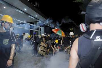 Hong Kong police clear protesters from legislature building