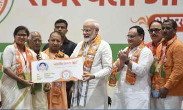  Prime Minister Narendra Modi with Uttar Pradesh Chief Minister Yogi Adityanath at the launch of BJP