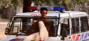 Gujarat cop flaunts TikTok video sitting on PCR van