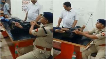 Shamli Police officer gives foot massage to kanwariya