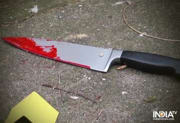 Man held for stabbing live-in partner