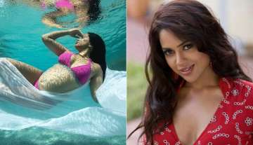 Race actress Sameera Reddy flaunts baby bump in underwater photoshoot