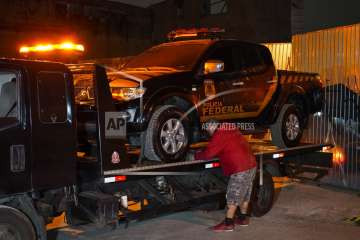 Eight armed men carried out a sophisticated heist at Sao Paulo's main international airport and mana