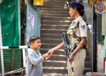 Adorable: Photo of CRPF personnel shaking hands with Kashmiri kid wins hearts