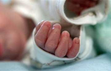 Woman delivers baby in hospital corridor, probe begins