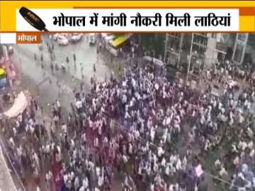 Bhopal power employees cane-charged